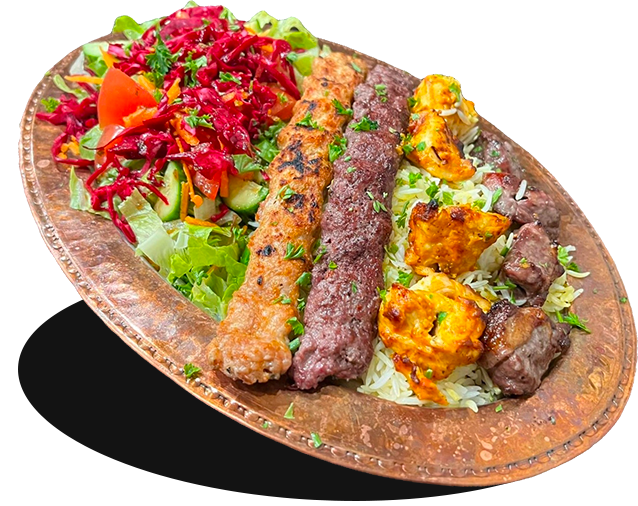 Mix grill plate with a lamb and beef kabab and chicken kabab.