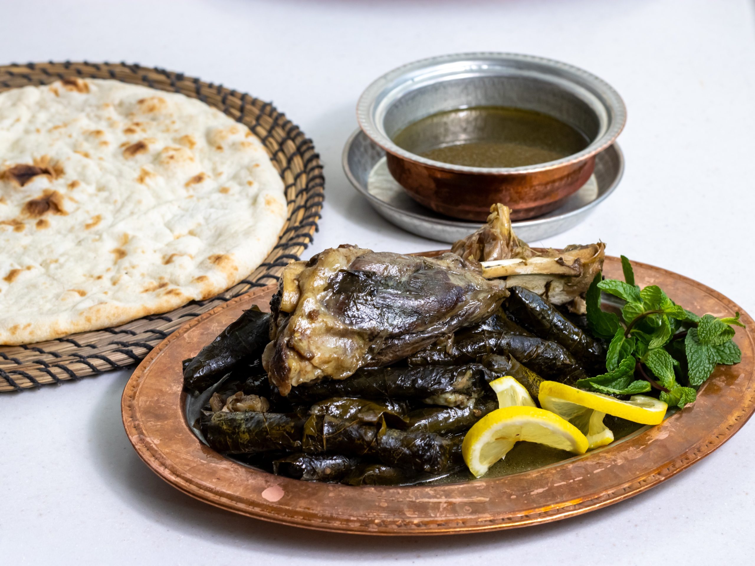 Stuffed grape leaves with lamb shank