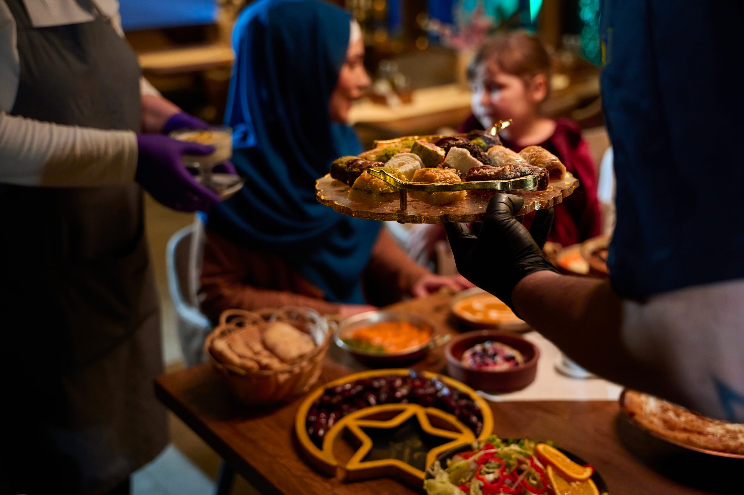 Woman Trying Kunefe at Ottawa Kabab