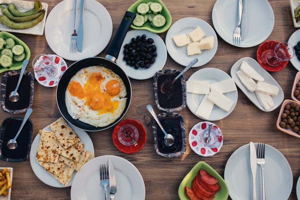 Syrian breakfast, eggs and cheese and olives.